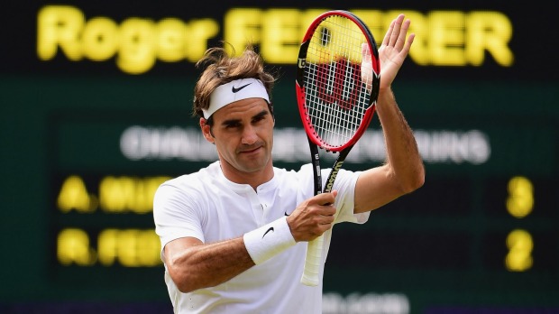 Sizzling form... Roger Federer celebrates after defeating Andy Murray in straight sets to make Sunday's Wimbledon final