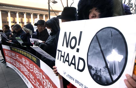 South Korean citizens protest the deployment of the THAAD system near the US embassy in Seoul Feb. 13 2015