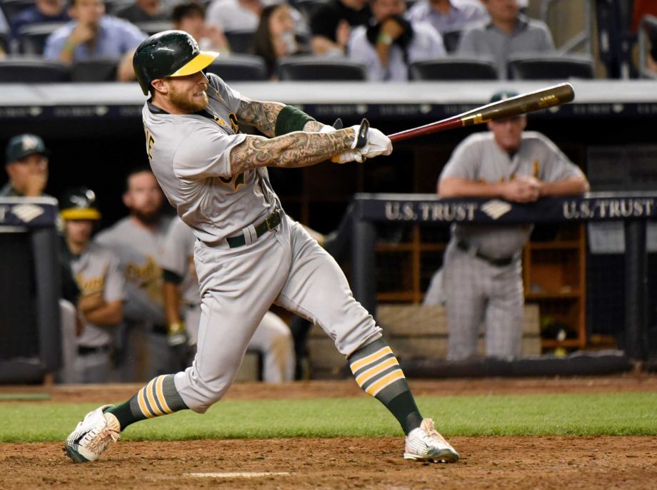 Oakland Athletics Brett Lawrie hits a home run during the 10th inning of a baseball game against the New York Yankees Tuesday