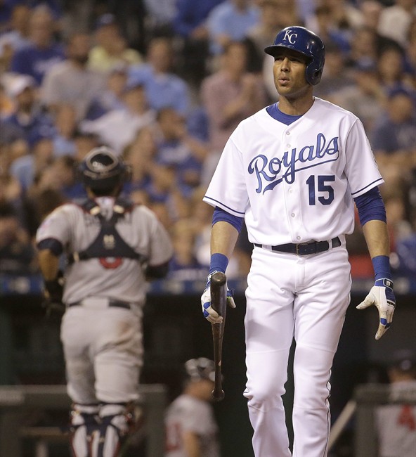 Kansas City Royals Alex Rios walks away from home plate after striking out to end the seventh inning of a baseball game against the Minnesota Twins on Thursday