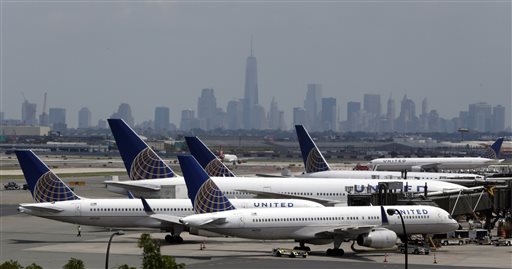 United Airlines jets are parked on the tarmac at Newark Liberty International Airport in Newark N.J. All United Continental flights in the U.S. were grounded Wednesday morning