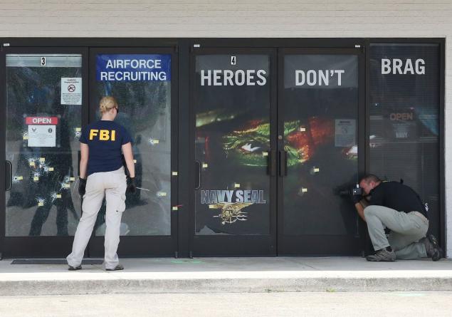 The FBI investigates the shooting at the Armed Forces Career Center  National Guard Recruitment Office in Chattanooga where guns were banned