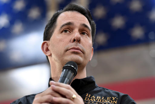 Republican presidential candidate and Wisconsin Governor Scott Walker speaks at a Harley Davidson motorcycle dealership in Las Vegas