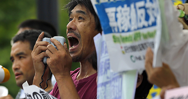 A protester shouts slogans during an anti-nuclear rally in front of Prime Minister's official residence in Tokyo Tuesday. Pic AP