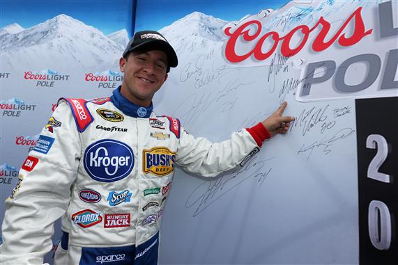 AJ Allmendinger celebrates winning the Sprint Cup pole at Watkins Glen International