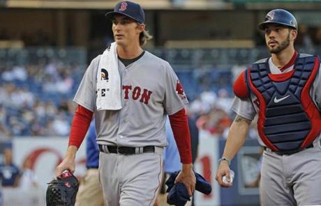 Boston Red Sox starting pitcher Henry Owens left walks in from the bullpen after warming up before his first Major League appearance in a baseball game against the New York Yankees at Yankee Stadium in New York Tuesday Aug. 4 2015. (AP