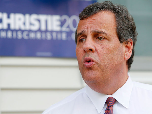 Gov. Christie talks with supporters at a house party in Salem N.H