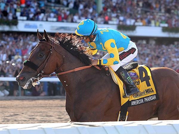 Jockey Victor Espinoza eased American Pharoah to the wire for a 2¼-length victory over Keen Ice on the 1 1/8-mile course finishing in 1 minute 47.95 seconds