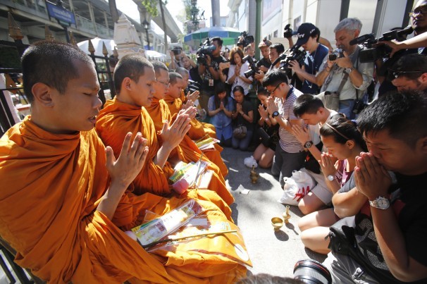 People gathered at the site to pray two days after an explosion that killed more than 20 people