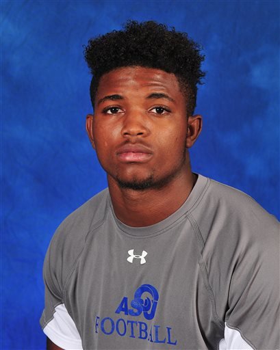 State University shows Christian Taylor. A police officer in suburban Dallas shot and killed Taylor a Angelo State University football player during a struggle after the unarmed 19-year-old crashed a car through the front