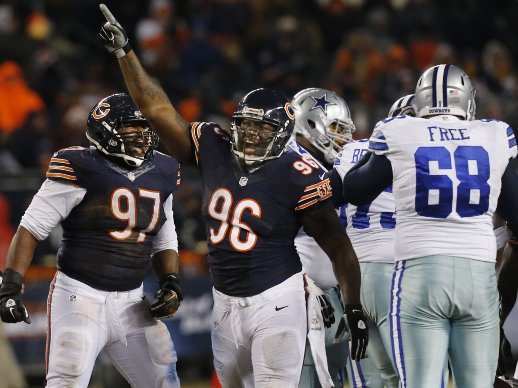 Chicago Bears nose tackle Jeremiah Ratliff celebrates a third quarter sack of Dallas Cowboys quarterback Tony Romo during the Dallas Cowboys vs. Chicago Bears NFL football game at Soldier Field in Chicago on Monday