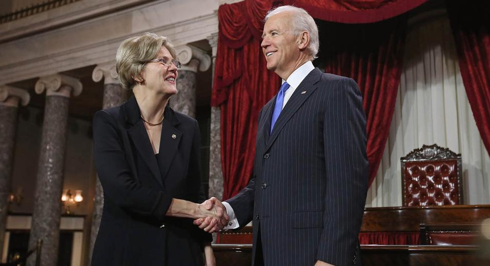 WASHINGTON DC JANUARY 03 US Sen Elizabeth Warren  participates in a reenacted swearingin with US Vice President Joe Biden in the Old Senate Chamber at the US Capitol