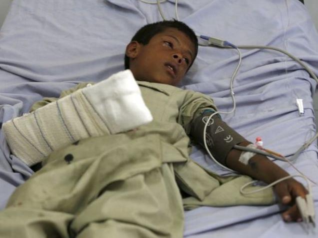 An Afghan boy receives treatment at a hospital after a suicide car bomb in Kabul on Monday. A car bomb exploded near the entrance to the Kabul airport killing at least five people and wounding 16 days after a series of suicide attacks in the Afghan capi