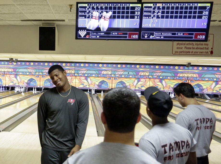 Tampa Bay Buccaneers quarterback Jameis Winston reacts after missing a spare during a bowling tournament between the Buccaneers rookies and Tampa Fire Rescue rookies Tuesday