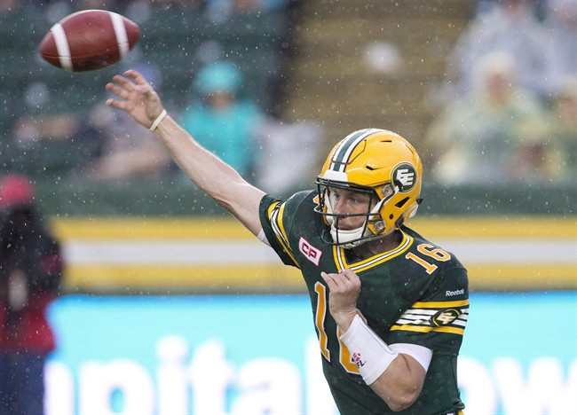 Edmonton Eskimos quarterback Matt Nichols passes against the Winnipeg Blue Bombers during first half CFL action in Edmonton Alta. on Saturday