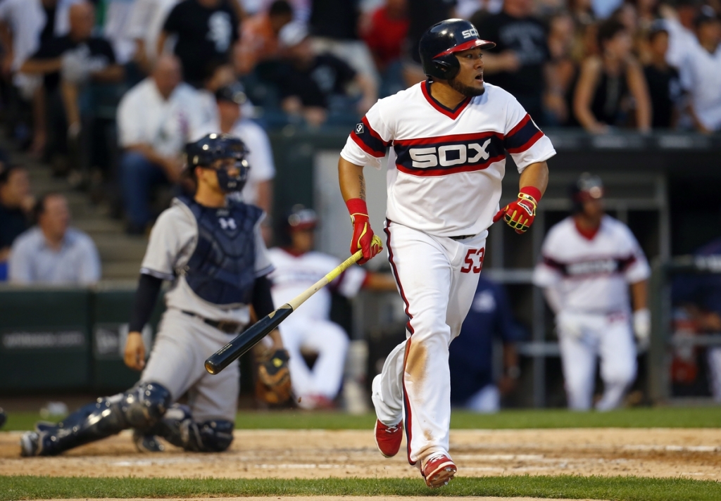 Chicago White Sox Melky Cabrera right and New York Yankees John Ryan Murphy watch Cabrera's three-run home run during the fifth inning of Saturday's game in Chicago. The White Sox won 8-2