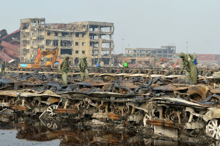 China blast death toll rises to 121 as probe pledged