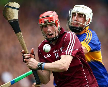 Closed down Tipperary's Patrick Maher puts pressure on Conor Whelan of Galway INPHO