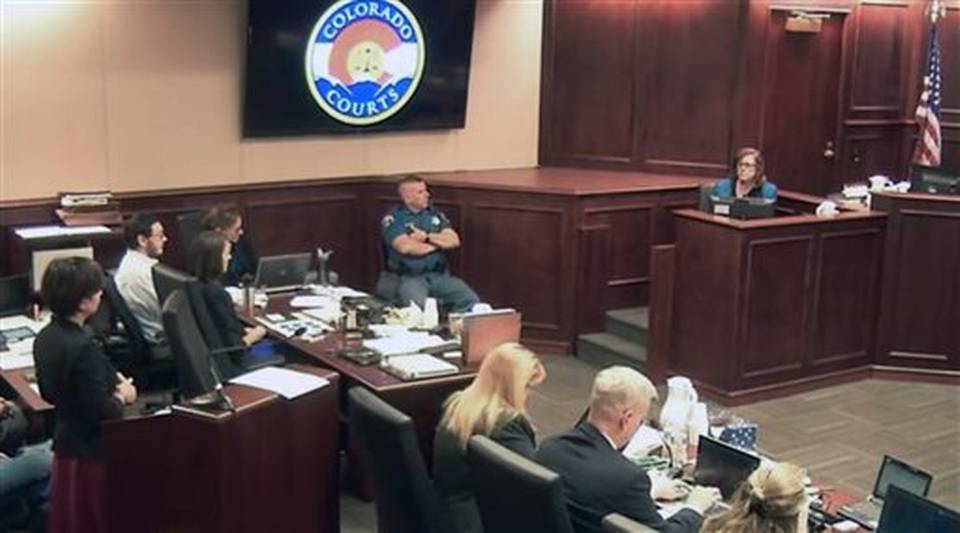 In this image made from Colorado Judicial Department video Arlene Holmes top right the mother of James Holmes second from left in white shirt gives testimony during the sentencing phase of the Colorado theater shooting trial in Centennial Colo.