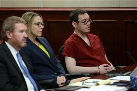 Colorado theatre shooter James Holmes appearing in court with his attorneys Daniel King and Katherine Spengler during sentencing today