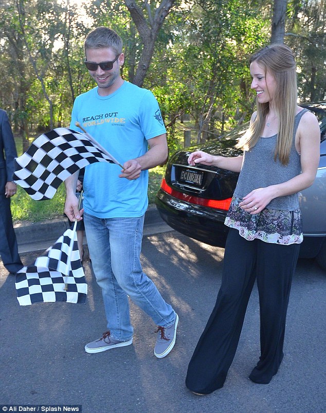 Crossed the finish line Cody Walker the younger brother of Paul Walker married his fiancee Felicia Knox on Saturday