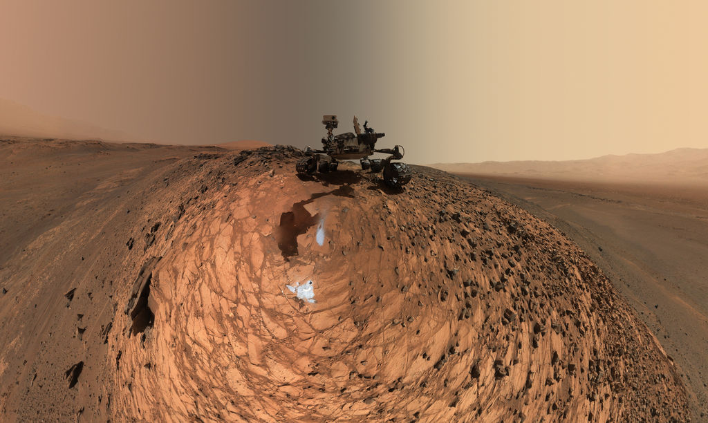 Curiosity rolls over onto Martian WET PATCH, takes satisfied selfie