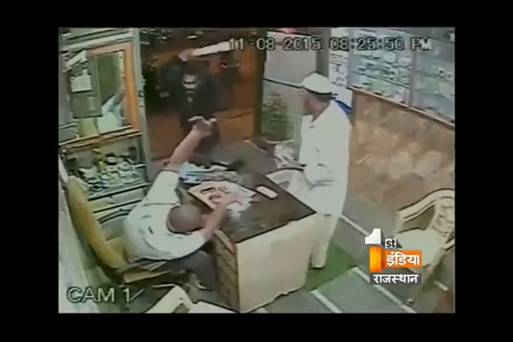 Video: Scary footage of Indian shopkeeper being attacked with a sword