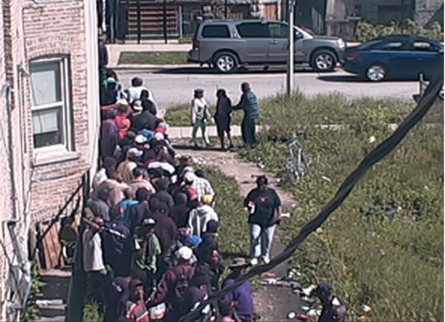 Customers line up for heroin in the 3700 block of West Grenshaw in Chicago