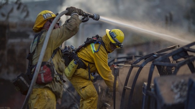 Firefighters battle fires in California