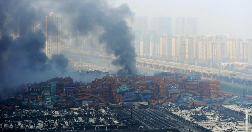 Rescue staff frantically dig by means of rubble in Chinese language port city