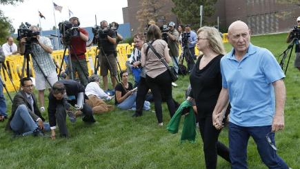 Lonnie and Sandy Phillips whose daughter Jessica Ghawi was killed in the cinema attack after speaking with the media in Centennial