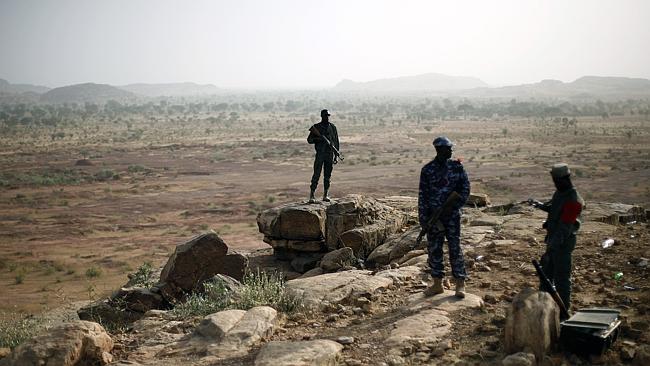 Siege over... Malian troops man an observation post outside Sevare Mali in 2013. Twelve