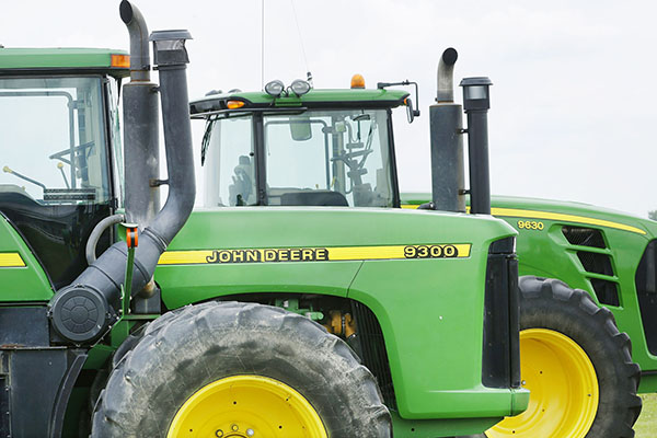 Deere profit falls 40 percent on weak demand for farm equipment