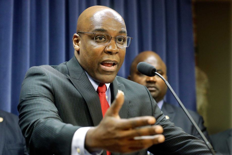 State Sen. Kwame Raoul D-Chicago speaks to reporters during a news conference at the Illinois State Capitol Wednesday Aug. 12 2015 in Springfield Ill. Illinois has become among the first states nationwide to establish wide-ranging law enforcement