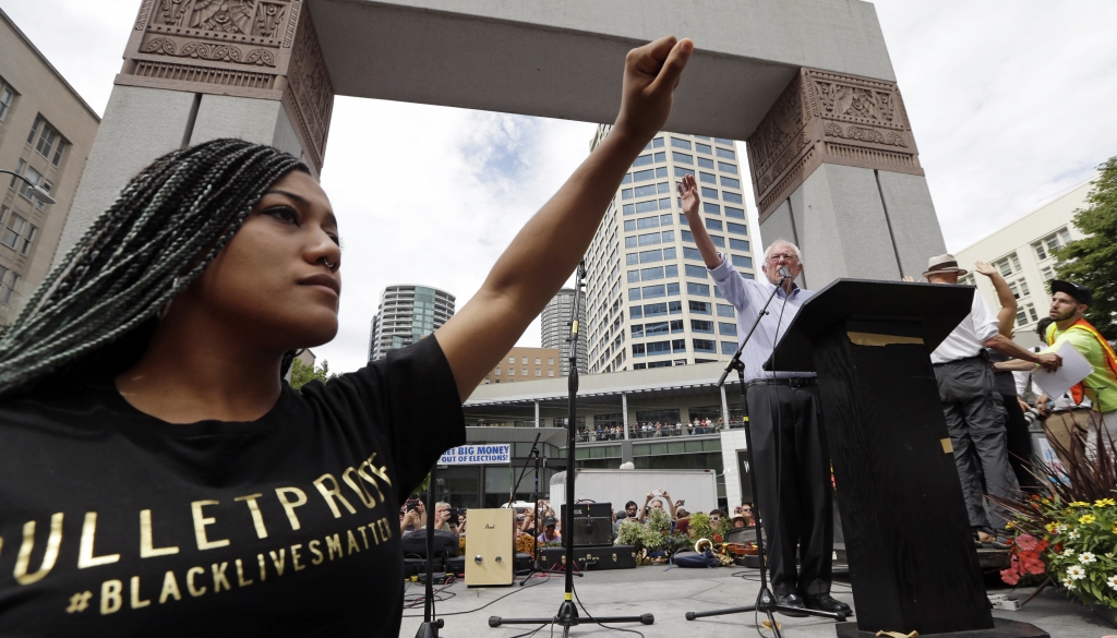 Mara Jacqueline Willaford left and other protestors prevented Sen. Bernie Sanders from speaking on Saturday Aug. 8 in downtown Seattle