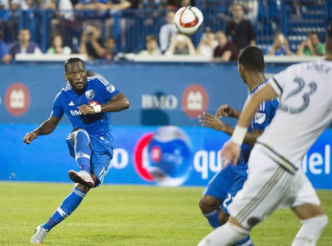 Montreal Impact's Didier Drogba takes a free kick against the Philadelphia Union during second half MLS soccer action in Montreal Saturday