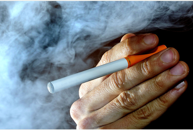 E-cigarettes 'should be prescribed on NHS&#039 to cut smoking deaths