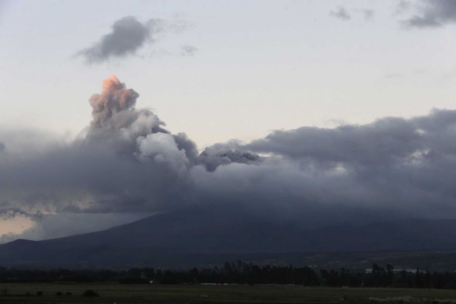 A view of Cotopaxi volcano spewing ashes as seen from Latacunga Ecuador Saturday Aug. 15 2015. The Cotopaxi volcano near Ecuador's capital has spewed ash over a wide area in pre-dawn blasts. The volcano is considered one of the world's most dangerous