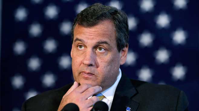 New Jersey Gov. Chris Christie listens to a question as he addresses a gathering at the Chabad House at Rutgers University Tuesday Aug. 25 2015 in New Brunswick N.J. Christie reached a $225 million settlement with Exxon Mobil over dozens of polluted