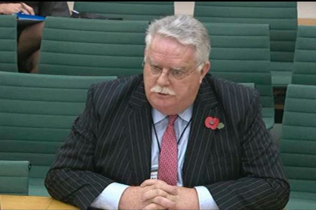 Former Co-op chairman Rev Paul Flowers appearing before a parliamentary select committee