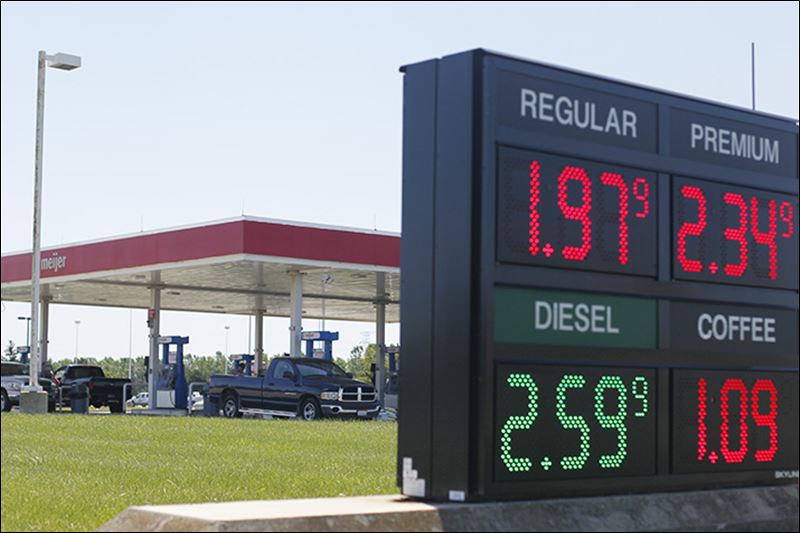 Gas prices projected to dip below $2/gallon