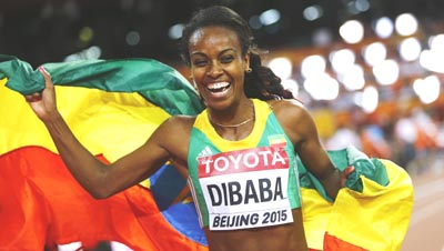 Dibaba celebrates winning the women's 1500 metres final at the 15th IAAF World Championships at the National Stadium in Beijing