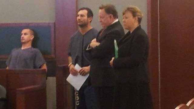 George Tiaffay appears with his attorneys during a court appearance in October 2012