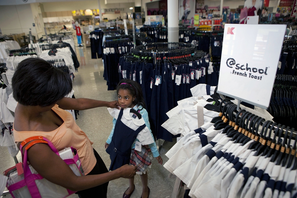 Phoenix Anderson 6 of Chicago shops for school uniforms with her mother Dana at Kmart on Addison Avenue in Chicago