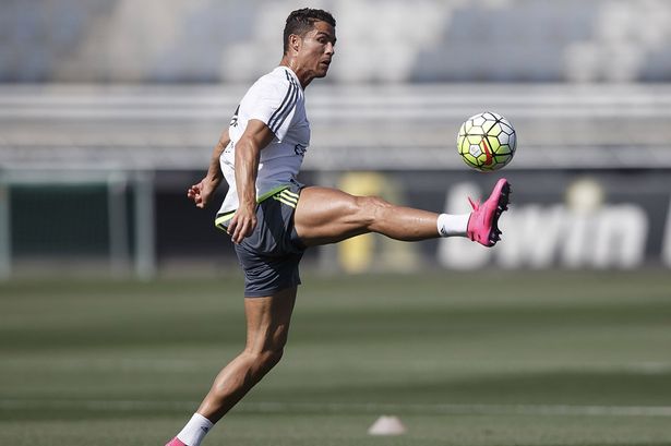 Cristiano Ronaldo of Real Madrid controls the ball during a training session at Valdebebas training ground