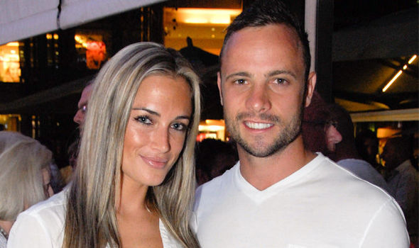 GettyOscar Pistorius with his girlfriend Reeva Steenkamp who he killed last Valentines Day