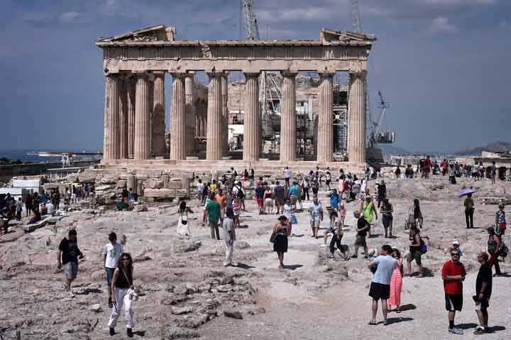 Strapped for cash in crisis-hit Greece but desperate to visit the Acropolis? Tourists faced with empty ATMs need not despair visitors to the ancient site can now pay by card for the