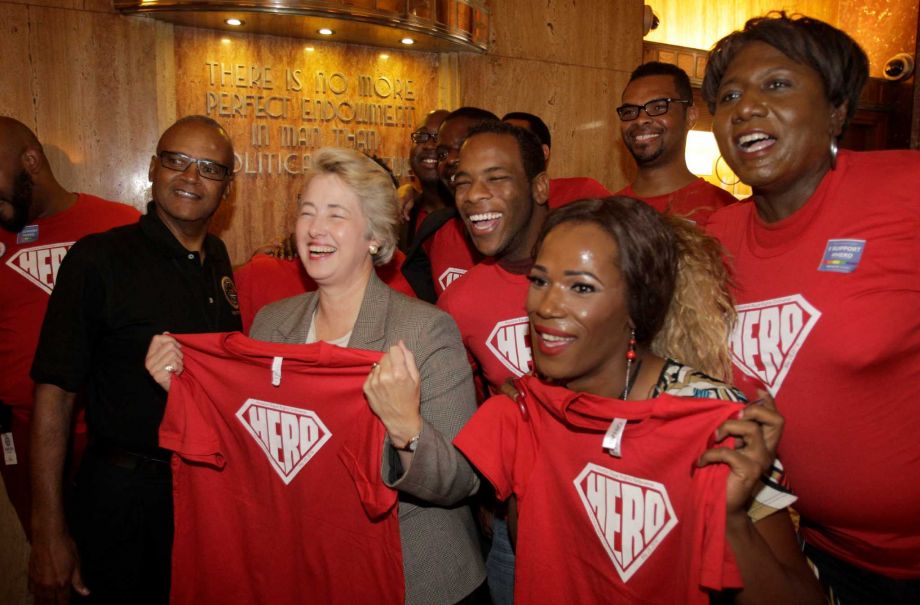 Houston Mayor Annise Parker poses with supporters after a media conference about the HERO ordinance