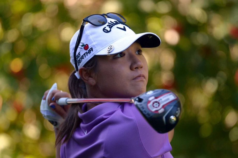 Lydia Ko of New Zealand watches her tee shot at the Canadian Pacific Women's Open golf tournament at the Vancouver Golf Club in Coquitlam British Columbia