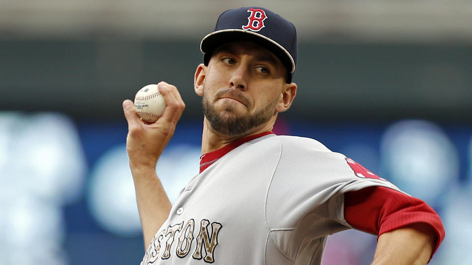 Boston Red Sox&#039 Matt Barnes throws in relief of starter Joe Kelly against the Minnesota Twins in the second inning of a baseball game Monday